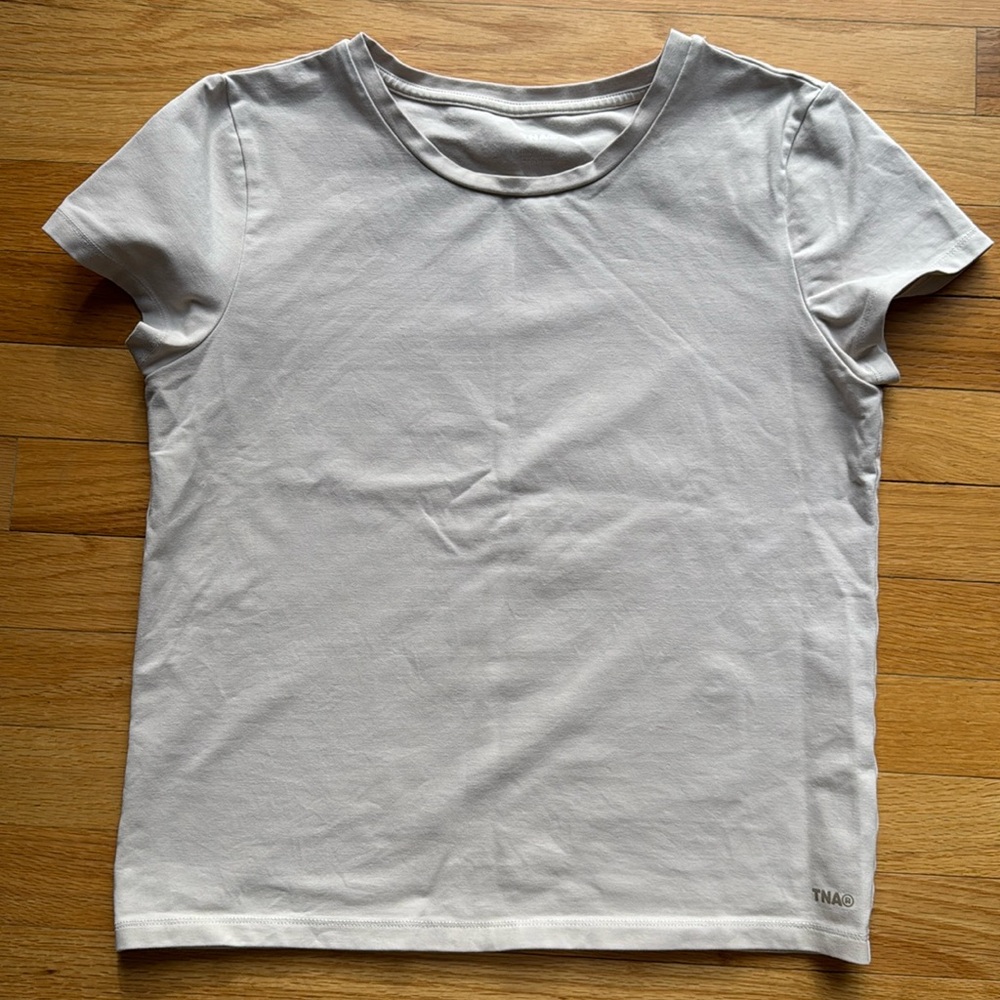 Aritzia TNA hold-it ortiz tee in Biege. Size L. Excellent. Like new condition.
